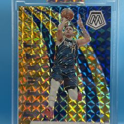 Luka Dončić 2023-24 Panini Mosaic - Elevate Reactive Yellow Mosaic Prizm #2  /99
