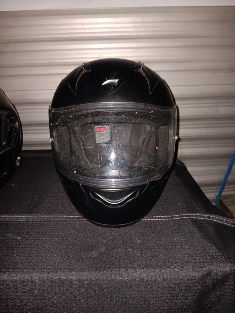 Two Motorcycle Helmets