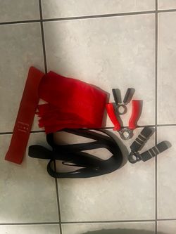 Hand grips, exercise bands, & PT leg stretcher.