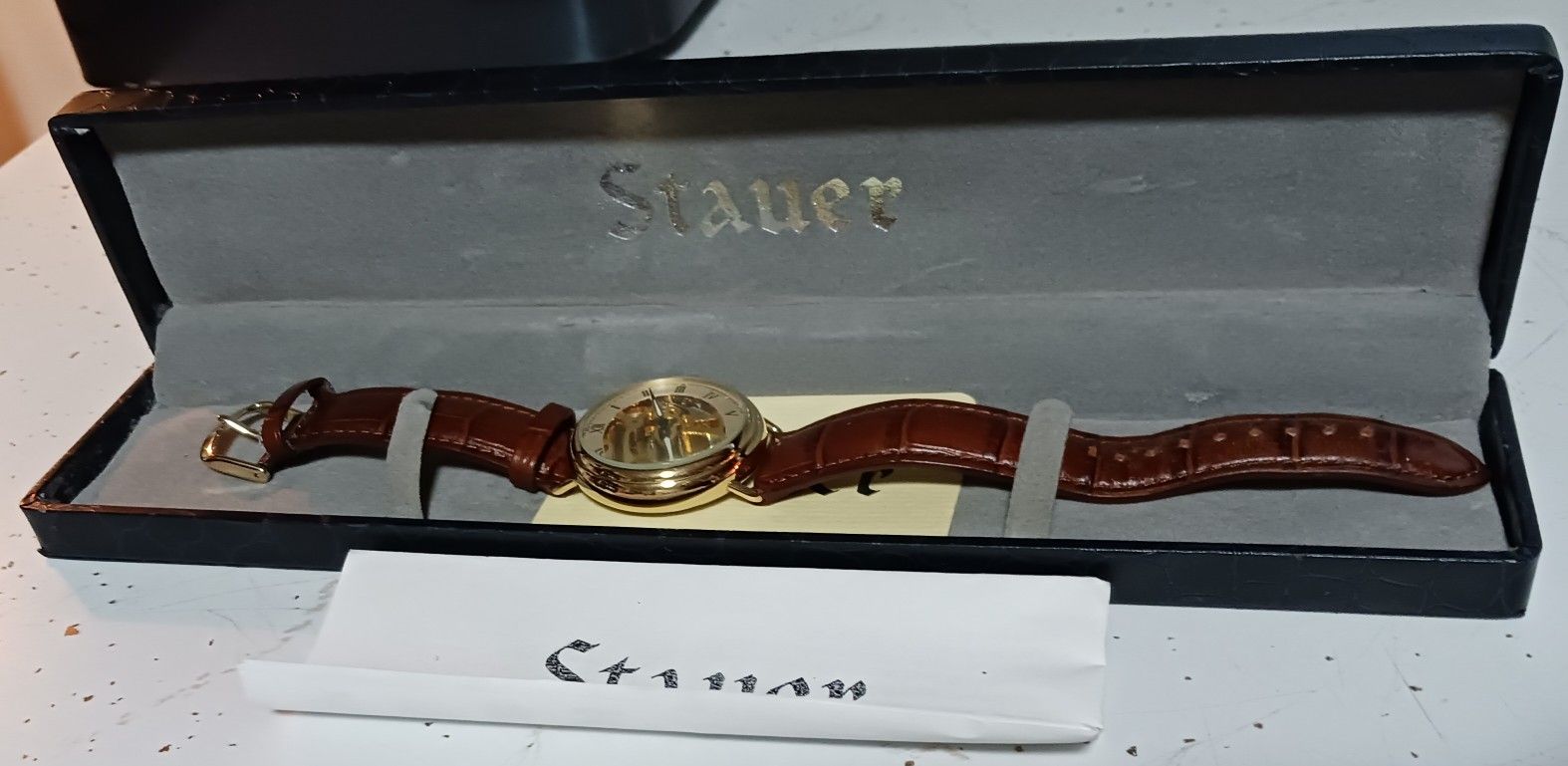 STAUER BRAND MEN'S SKELETON WATCH, 14636 STAINLESS STEEL CASE, LEATHER BAND, DUPLICATE SOLD FOR $59
