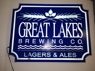 Great lakes,LED light. Very heavy,well made. Perfect man cave light