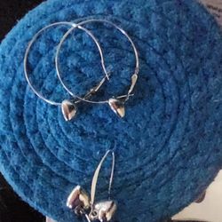 2 pairs heart earrings pierced.