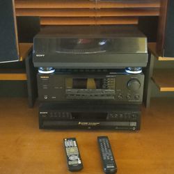 Polk Audio Speakers,  Sony Turntable and CD Player,  and Onkyo receiver. 