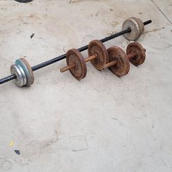 Bar 2 Dumbells  About  70 Pds