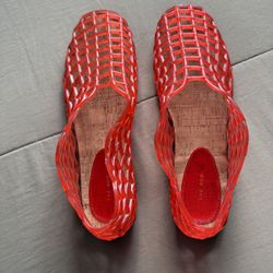 Authentic THE ROW red jelly lattice flats with sculptural grid design and cork-style insole. Made in Italy. Avant-garde and breathable, perfect for mi