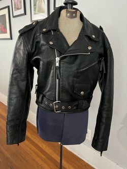 Woman's black leather cropped moto jacket
