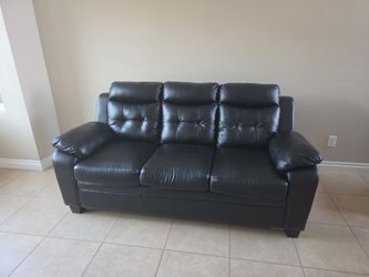 Black leather sofa