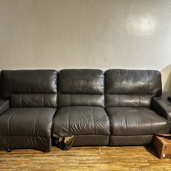 Leather couch with reclining seats