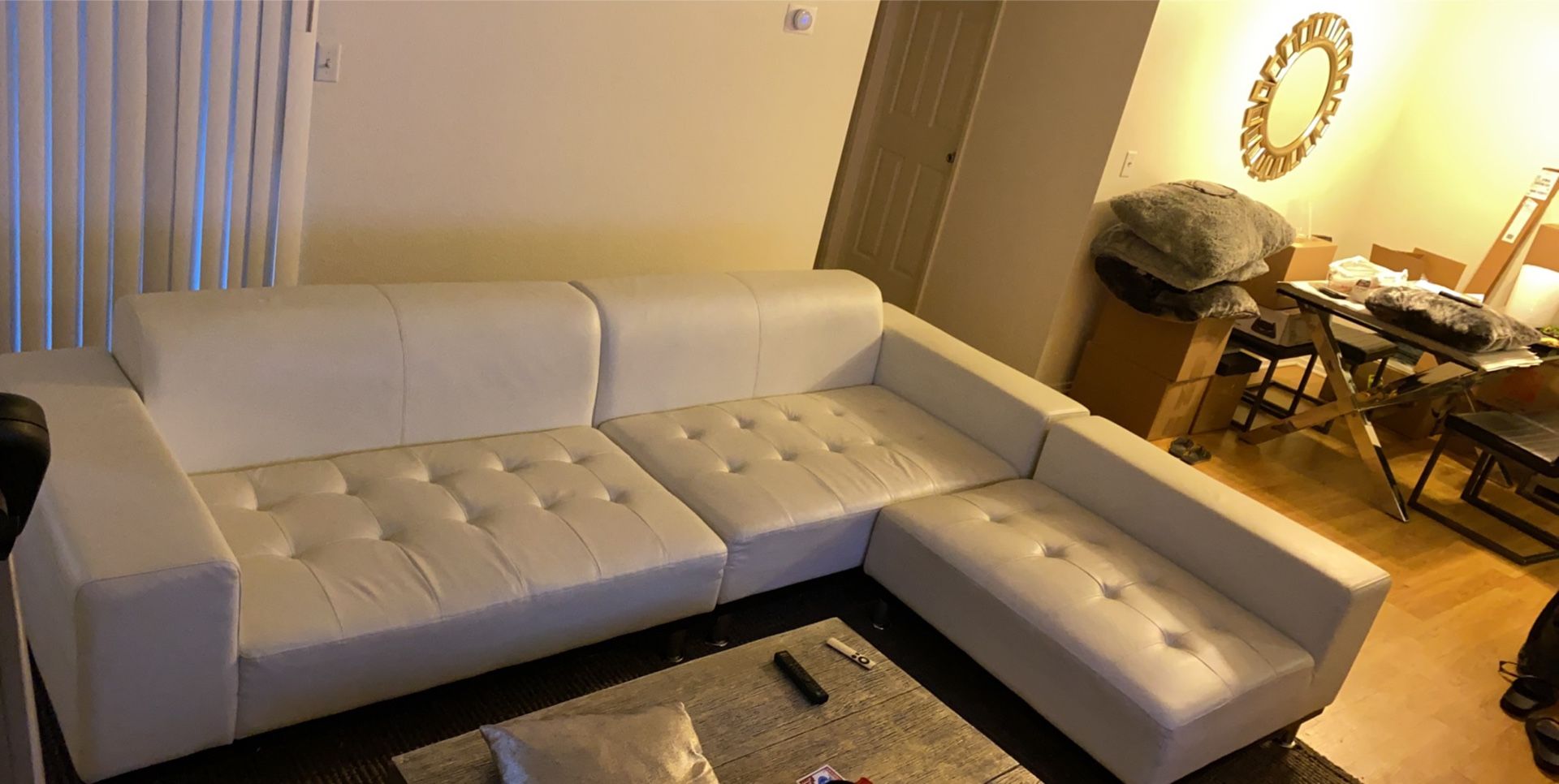 White leather sectional couch in good condition must go!!