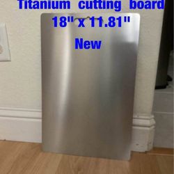 Titanium  cutting  board  -  $25   (new)
