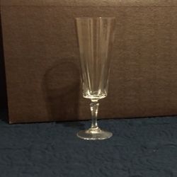 Genuine crystal champagne flutes. (2 boxed pkgs of 4) Only one ever unpacked.