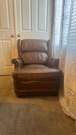 Antique Brown Leather Wingback Armchair