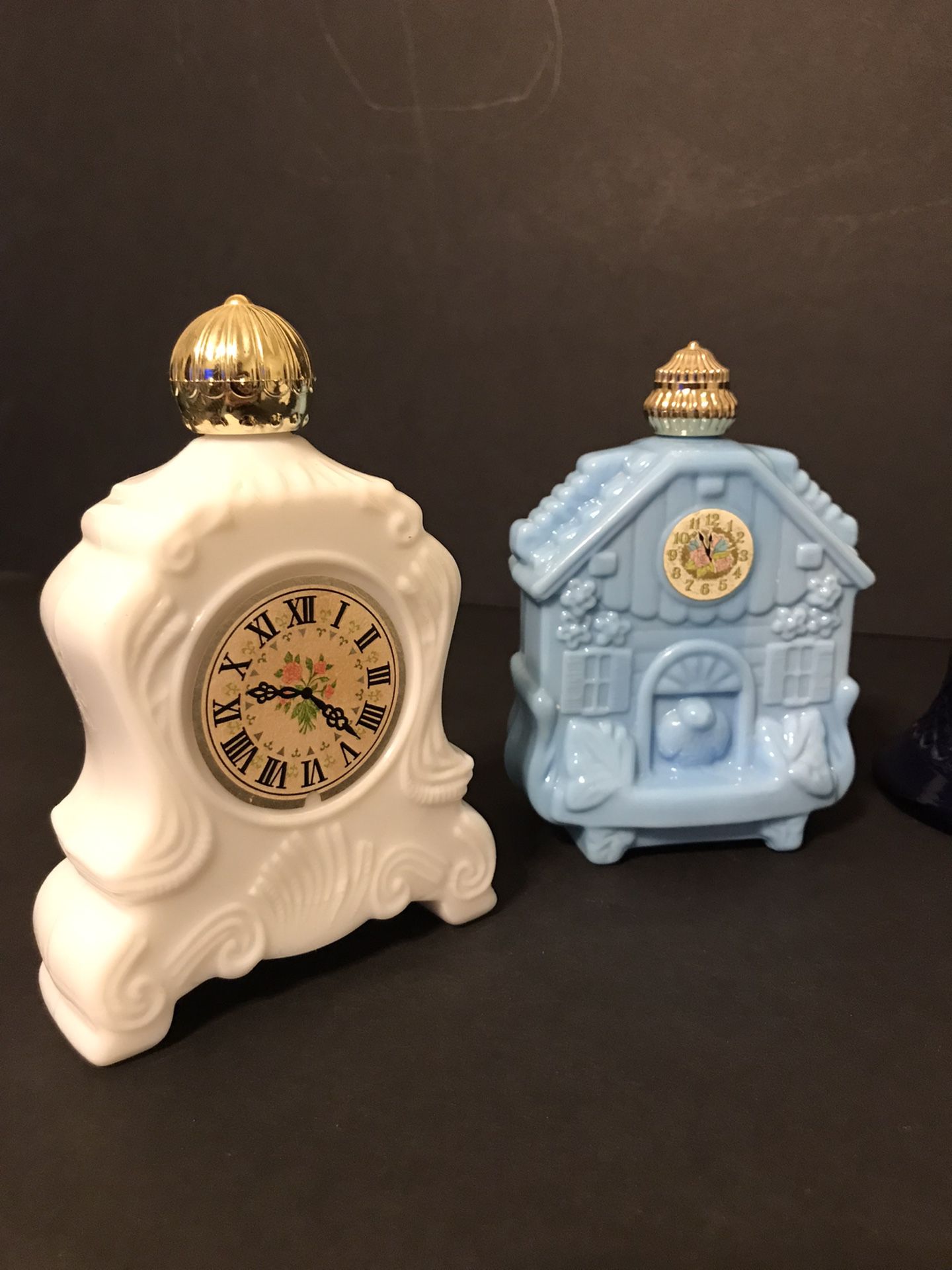 4 Vintage Avon Fairytale Bottles- 2 Large Clocks, 1 Stagecoach, 1 Blue Bell