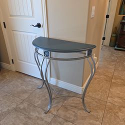 Half moon side table with metal base