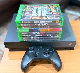 Xbox One X Project Scorpio Edition Console + Controllers + Games