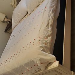 Full size bed frame with box spring.