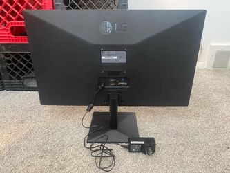 LG 24ML44B-B monitor, detailing its power rating (19V ⎓ 1.3A), manufacture date (10/2020), and regulatory compliance information.