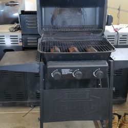 1 Asador Chico Y Una Dispenser De Agua.