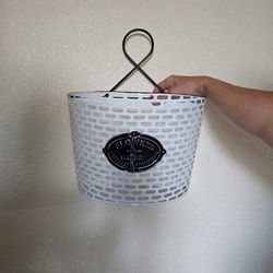 Cute black & white flower pot holder.