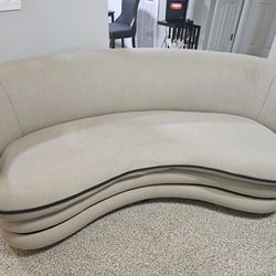 C-Shaped Beige/Black Trimmed Sofa - a comforting difference  to Your Happy Place
