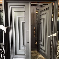 Wrought iron door, front door.