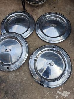 70s chevy hubcaps  set of 5