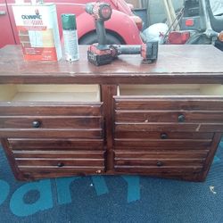 Has 6 Drawers All Wood  All Drawers Work Good 