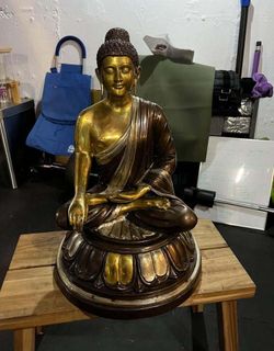 Exotic India Tibetan Buddhist Lord Buddha in Bhumisparsha Mudra - Brass Statue - Color Brown Silver