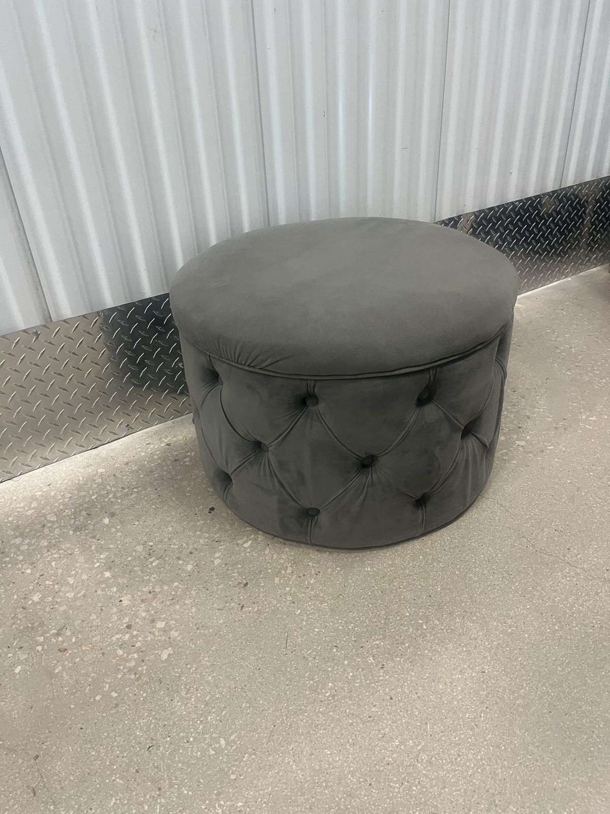 Gray velvet tufted ottoman. Also Holds Up To 10 Pairs Of Shoes-24” round ,16” high $50
