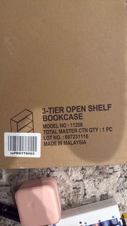 1 unopened. Bookshelf.
