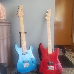 2 Guitars And Amp