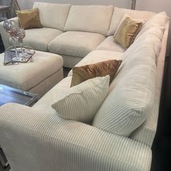 Beige Sectional & Ottoman 