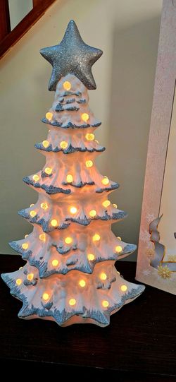 Never used, Cracker barrel,  20"×12", plug in light, white ceramic christmas tree, firm.,