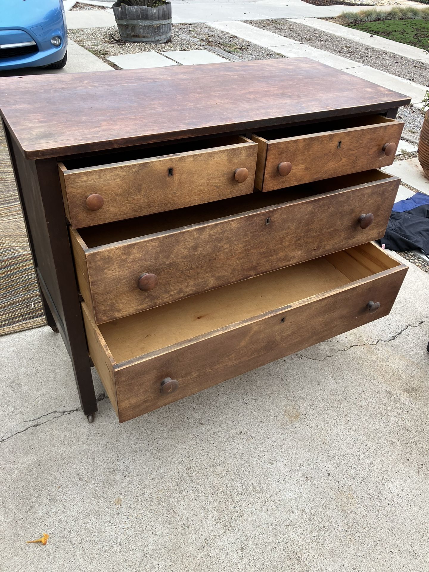1920's cabinet with drawers on wheels