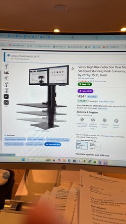 Dual monitor stand to sit desk