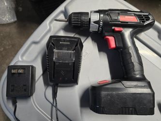 Drill with battery and charger $15