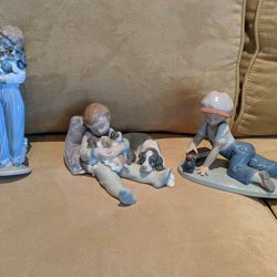 Set of three Lladro figurines: Sweet Dreams, All Aboard and My Buddy
