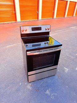 Ge 30-in Glass Top 4 burners 5.3-cu ft Freestanding (Stainless steel)