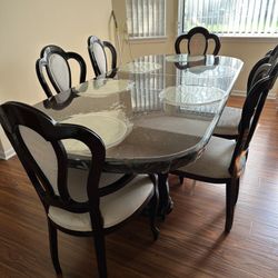 Dining Table And 6 Chairs $299.00. OBO