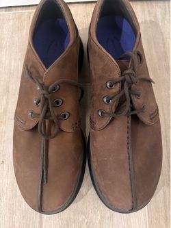 Merrel brown suede lace up shoes