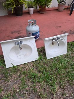 2 lavamanos y bombita con  gas