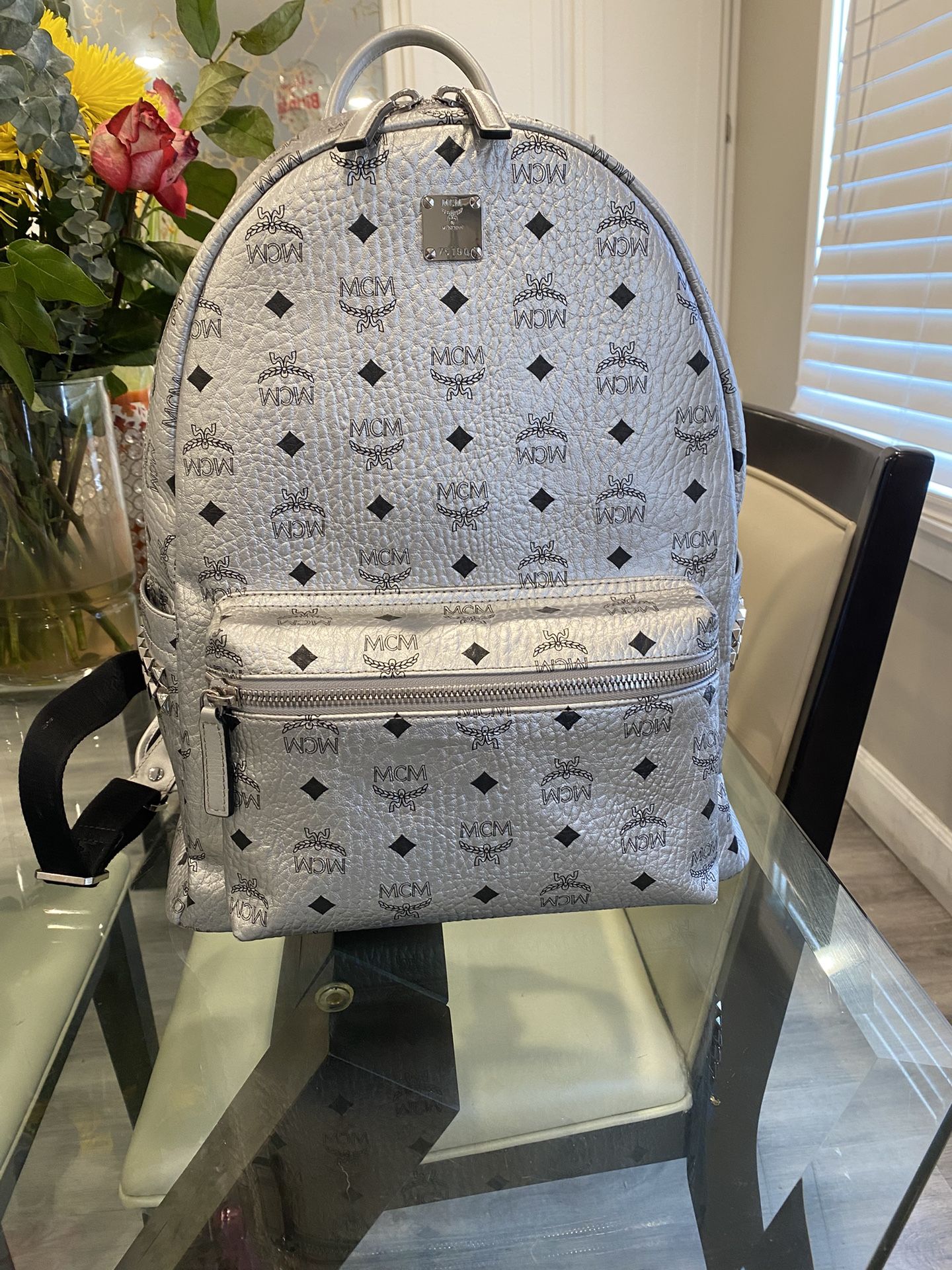 medium silver mcm backpack stark side studs visetos
