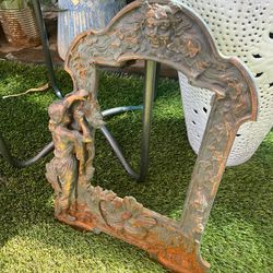 Art deco frame , cast iron. About a Ft