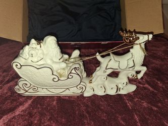 Mikasa fine porcelain Santa and sleigh. This is in the Box and in new condition! All sales final.