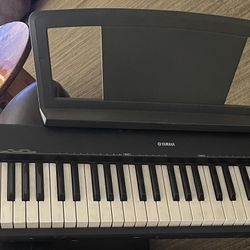 Yamaha grand NP 30 keyboard piano