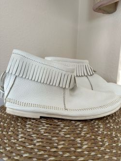 Women’s White Minnetonka Moccasins with back zipper