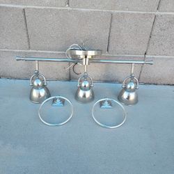 3 LIGHT FIXTURE CHROME BULBS INCLUDED AND 2 TOWEL RINGS