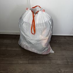 A big bag of girls clothes Size S6-XL16