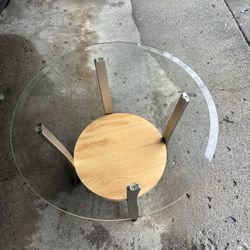 End Table With Glass Top And A Wooden Shelf 
