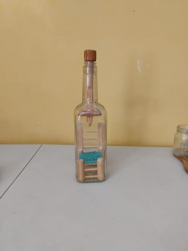 Bottle with a seat inside. Unique bottle. 